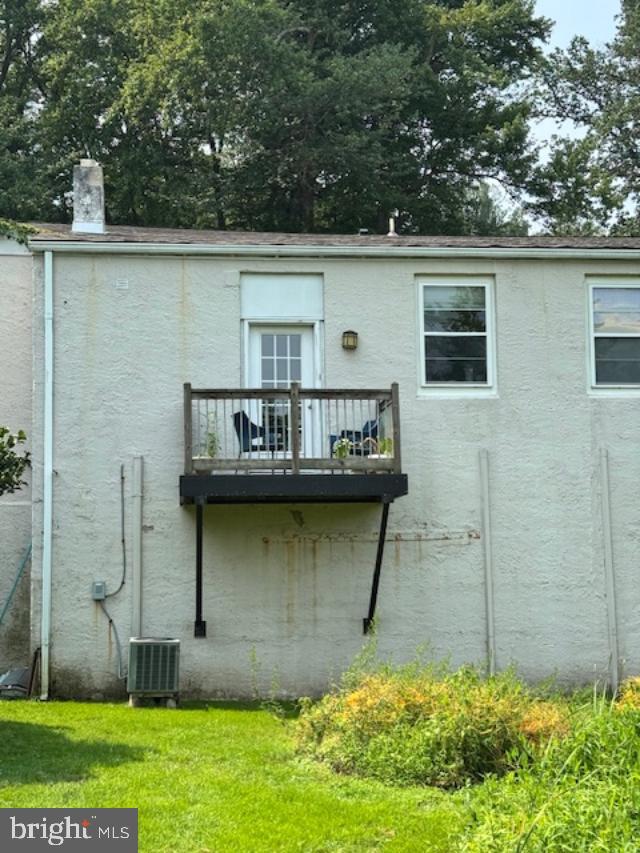 85 Valley Road, Unit 3 Phoenixville, PA 19460 - Photo 28 of 34 a view of a backyard with plants and large tree