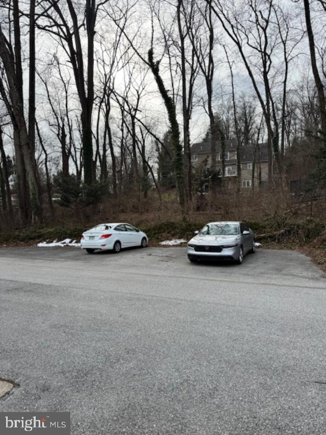 85 Valley Road, Unit 3 Phoenixville, PA 19460 - Photo 33 of 34 a car parked on the side of the road