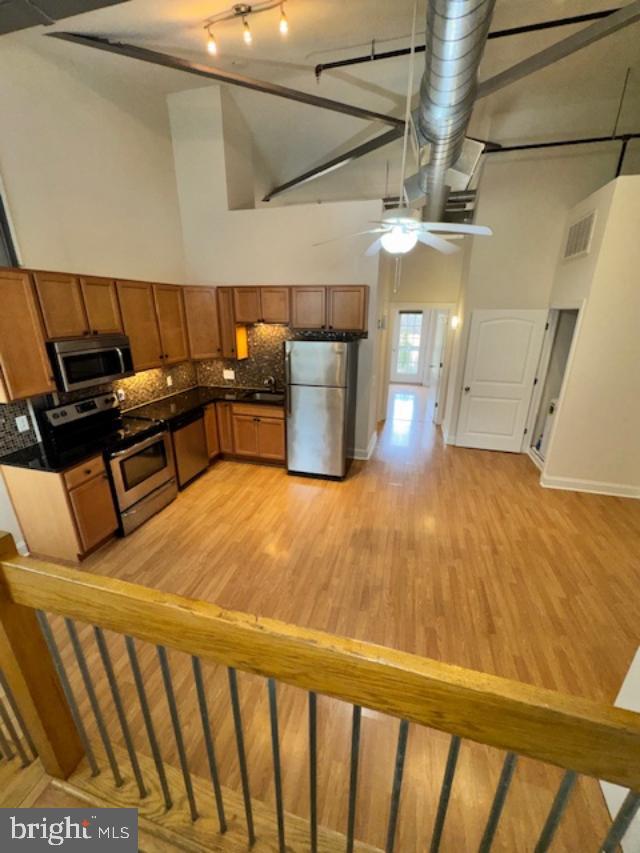 85 Valley Road, Unit 3 Phoenixville, PA 19460 - Photo 10 of 34 a bedroom with a bed and wooden floor