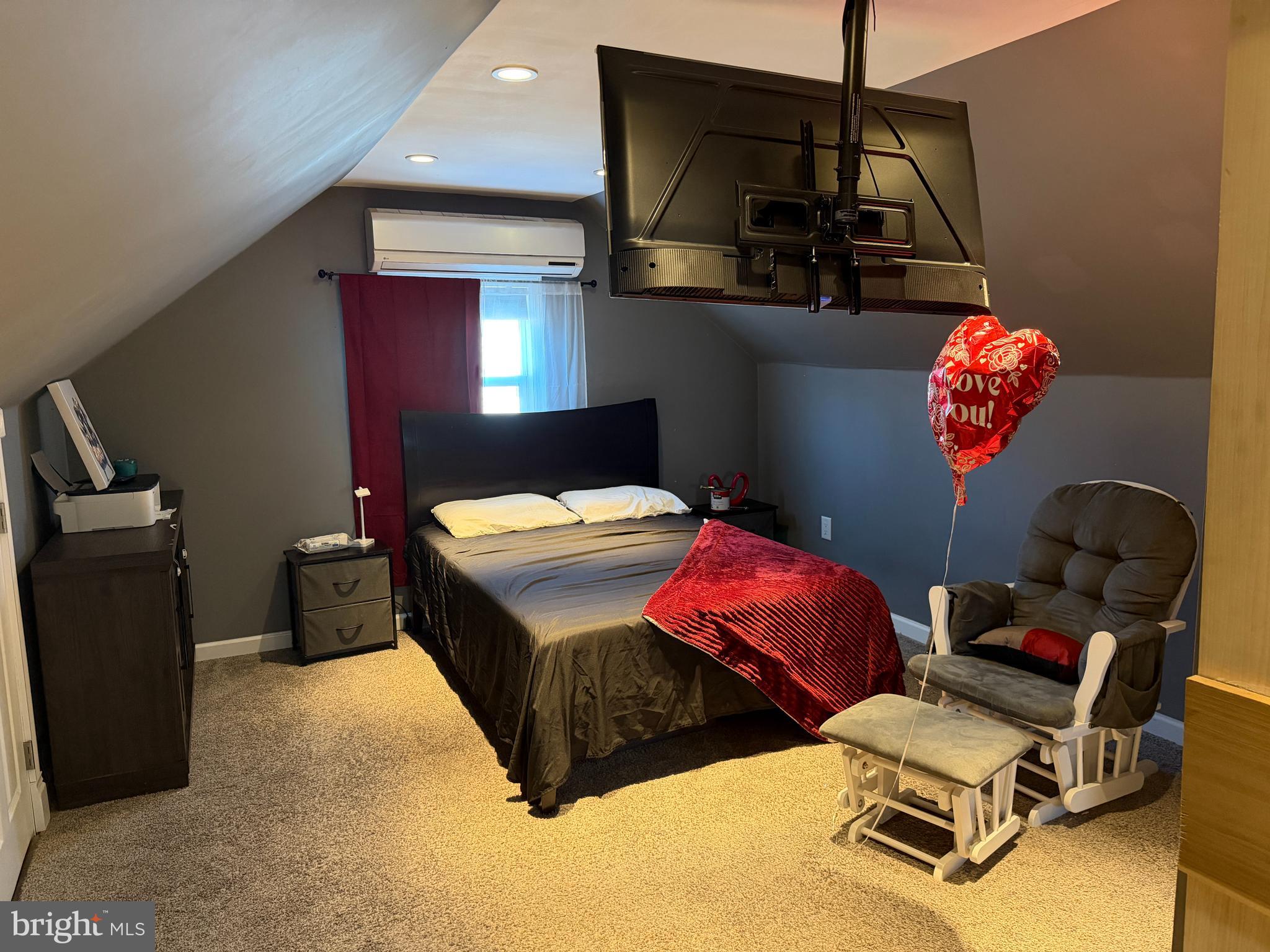 127 Dory Court Beverly, NJ 08010 - Photo 10 of 16 a bedroom with a bed and a chandelier