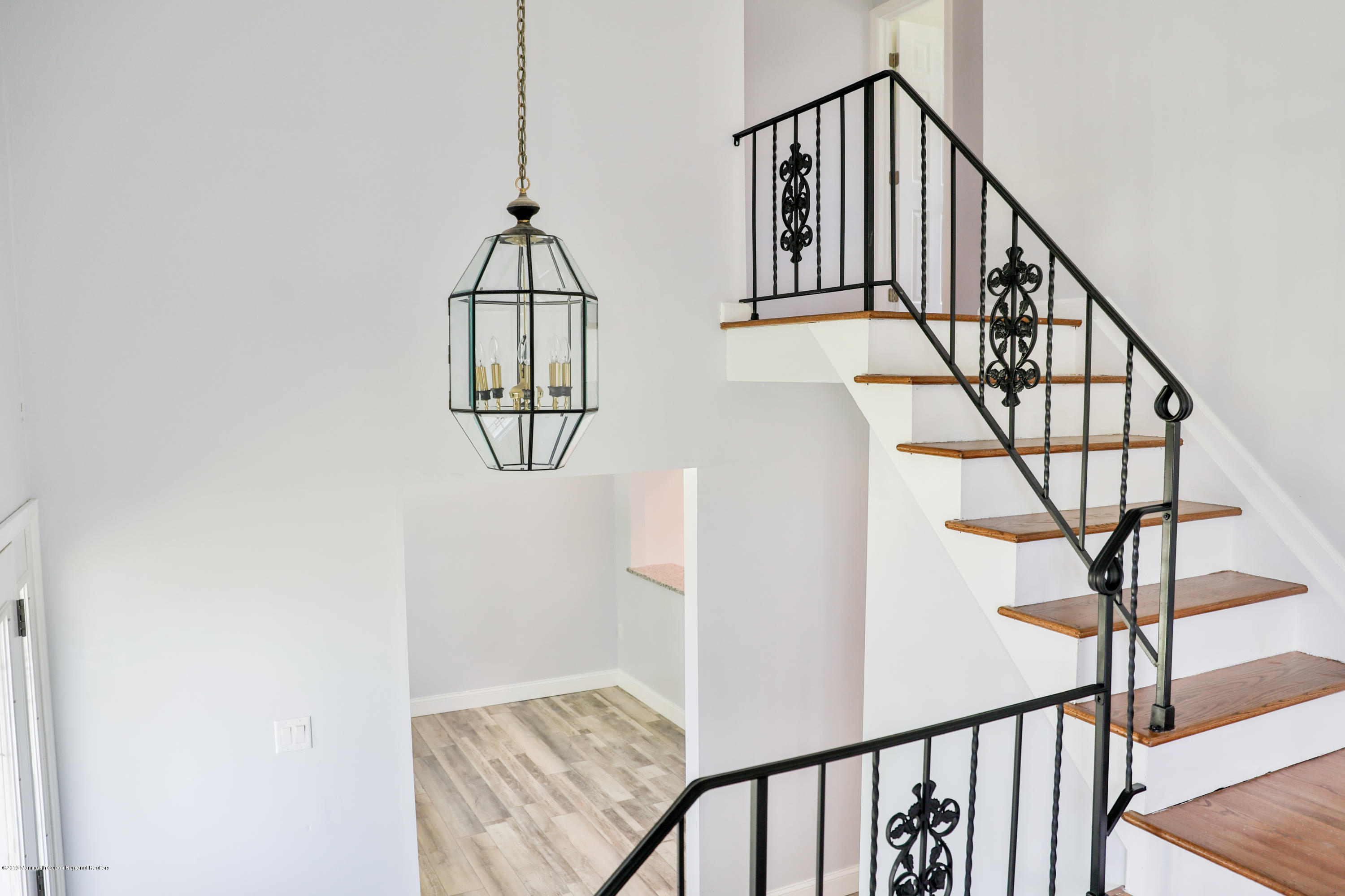3 South Westfield Road Howell, NJ 07731 - Photo 3 of 15 a view of staircase with railing and white walls