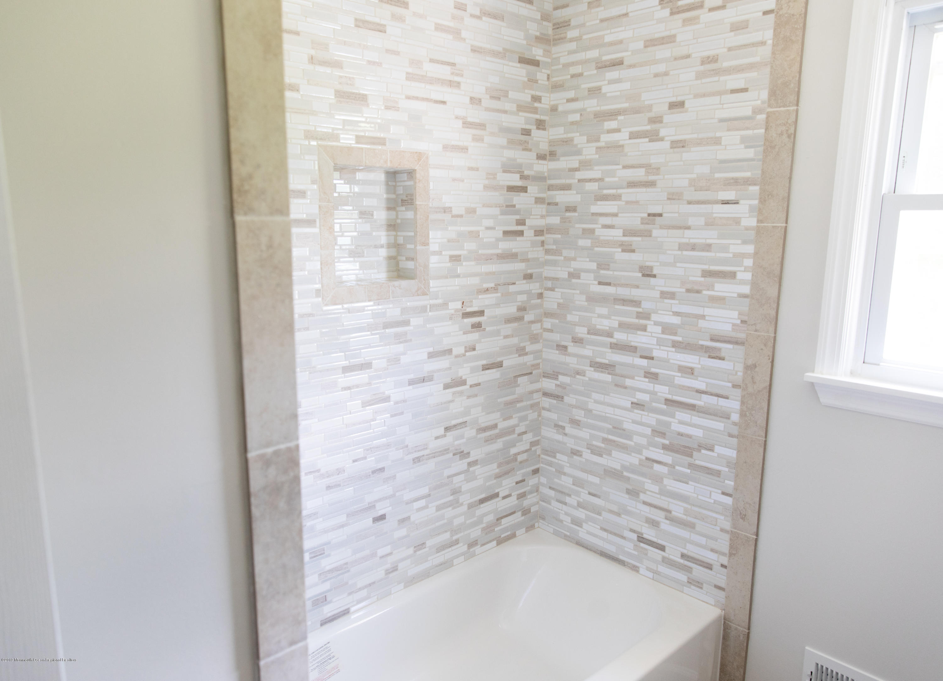 3 South Westfield Road Howell, NJ 07731 - Photo 8 of 15 a bathroom with a bathtub