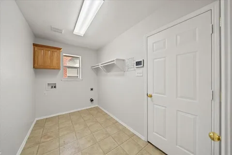 a view of a dining room with furniture wooden floor and a chandelier