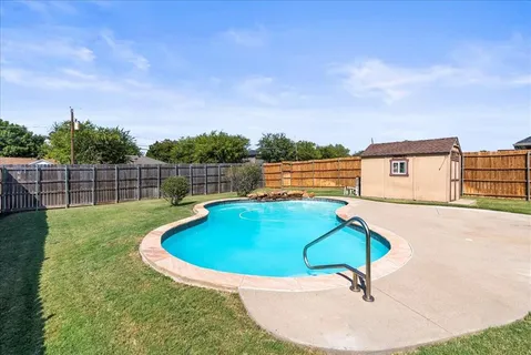an aerial view of a swimming pool and mountain view
