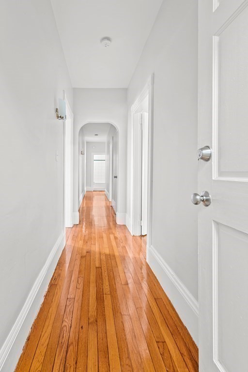 27 Bailey Street Boston, MA 02124 - Photo 20 of 35 a view of a bedroom from a hallway