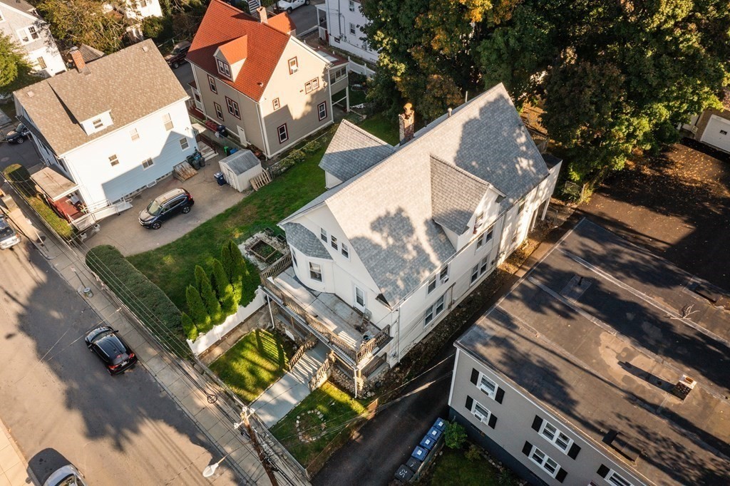 27 Bailey Street Boston, MA 02124 - Photo 2 of 35 an aerial view of a house with a garden