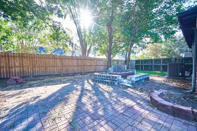 a view of a backyard with green space