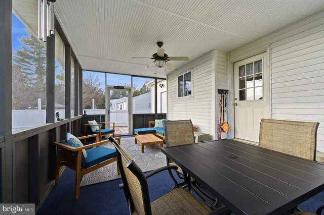 a view of a workspace with furniture