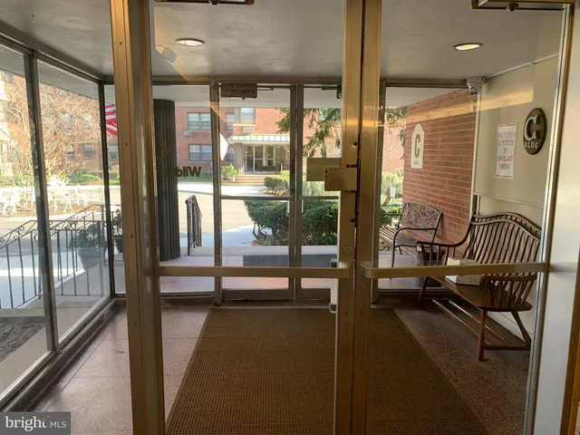 a view of a balcony with chairs