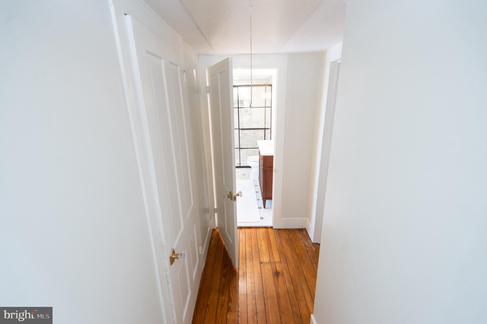 533 South Street Easton, MD 21601 - Photo 38 of 47 view of room with wooden floor and window