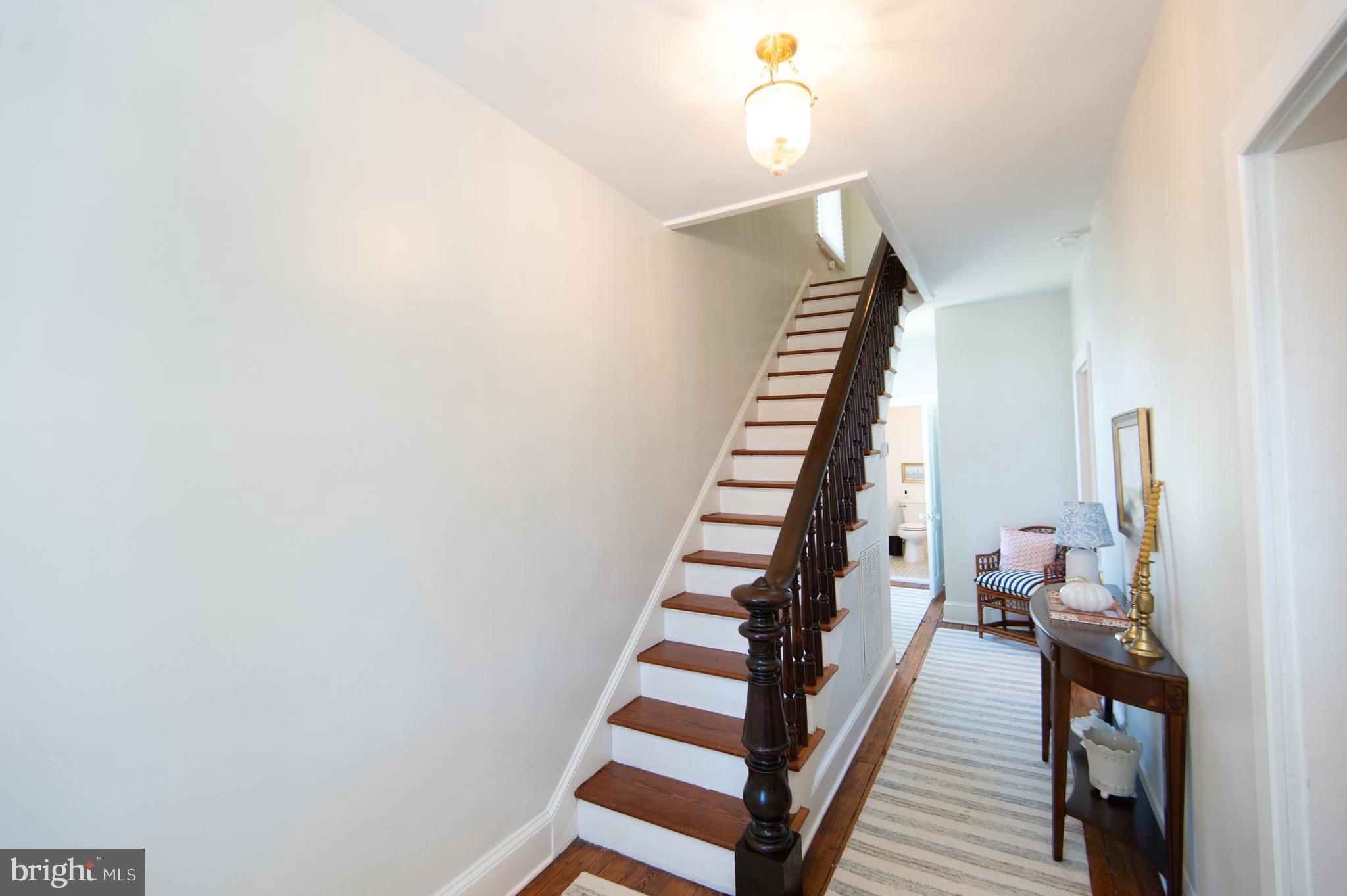 533 South Street Easton, MD 21601 - Photo 10 of 47 a view of a hallway with wooden floor and entryway