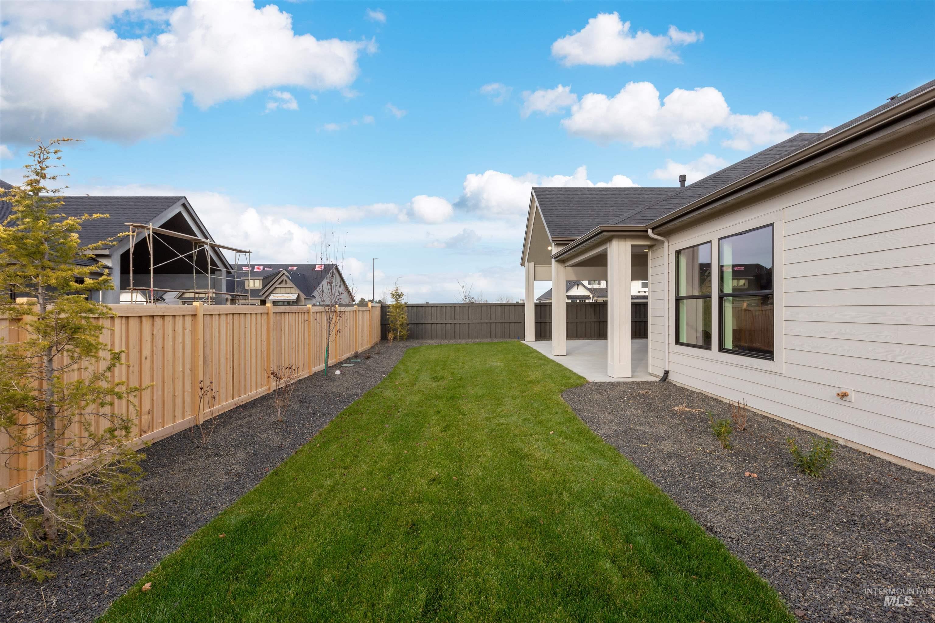 6865 South Utmost Way Meridian, ID 83642 - Photo 31 of 31 Fenced backyard with a patio area
