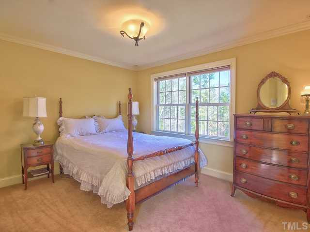 14412 Possum Track Road Raleigh, NC 27614 - Photo 14 of 25 2nd bedroom with beautiful view of garden and back yard. Bedroom