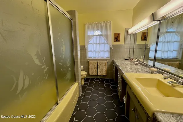 a view of a backyard of the house