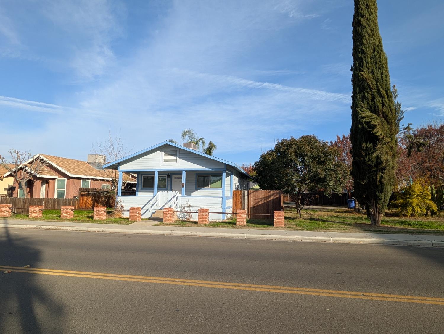 512 Sunset Street Coalinga, CA 93210 - Photo 3 of 24 a view of street with houses