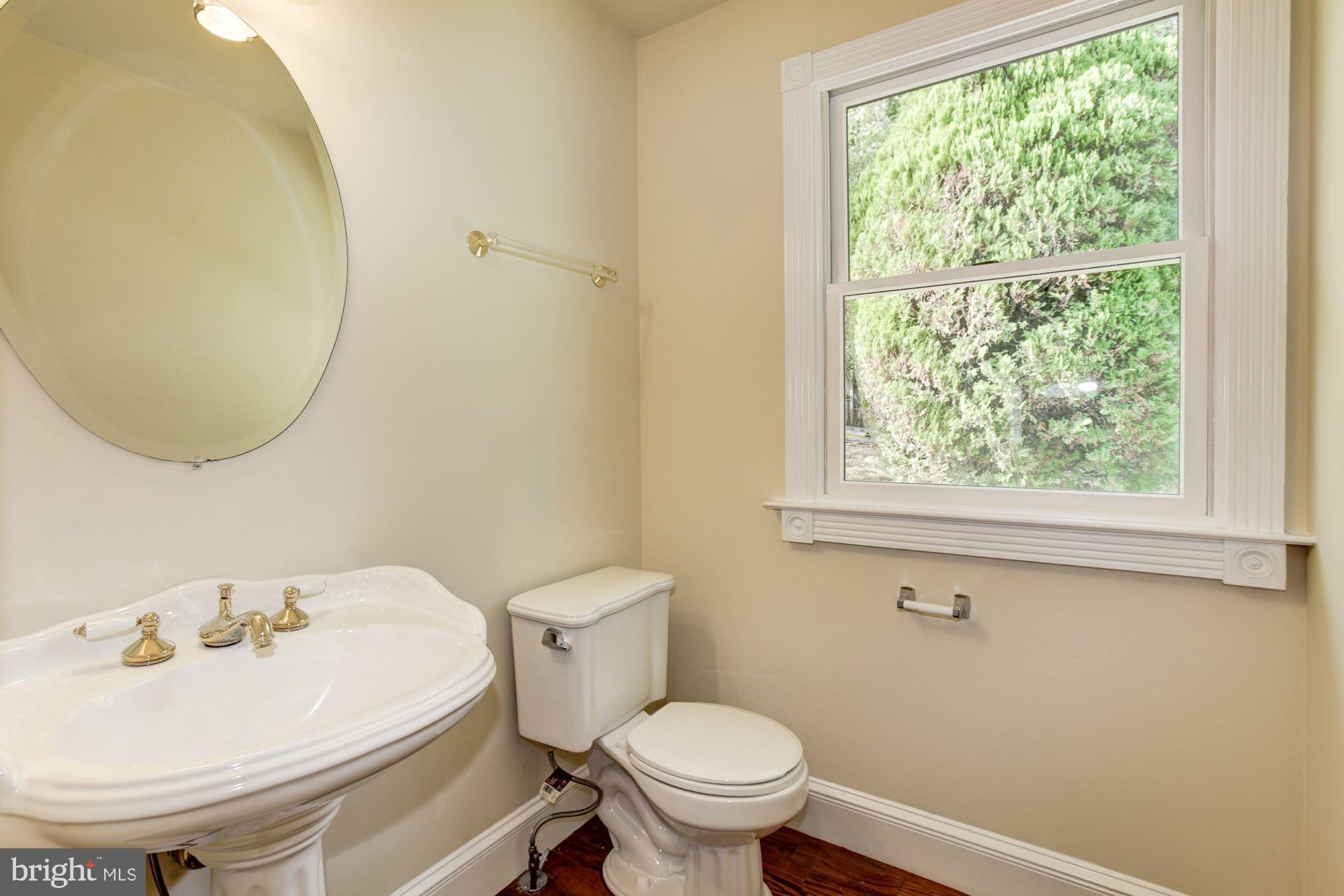 6420 Darwin Road Laurel, MD 20707 - Photo 14 of 53 main level half bath