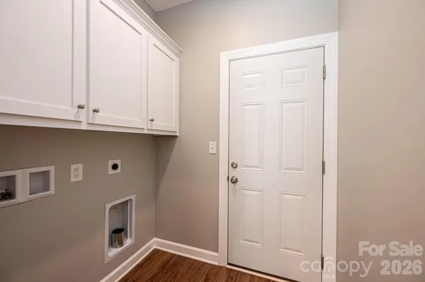 a view of cabinets and window