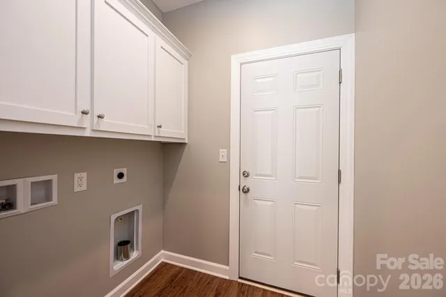 a view of cabinets and window