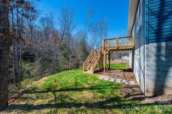 a view of a backyard with a small house