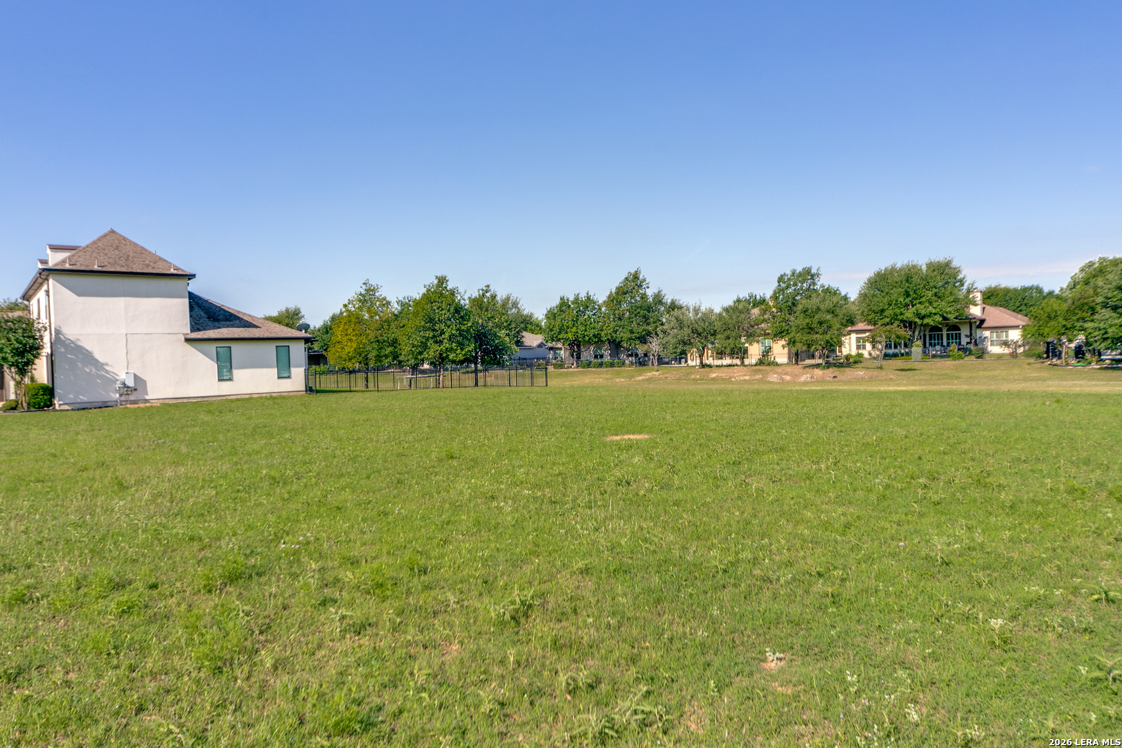 30039 Cibolo Path Fair Oaks Ranch, TX 78015 - Photo 8 of 11 a house view with a garden space