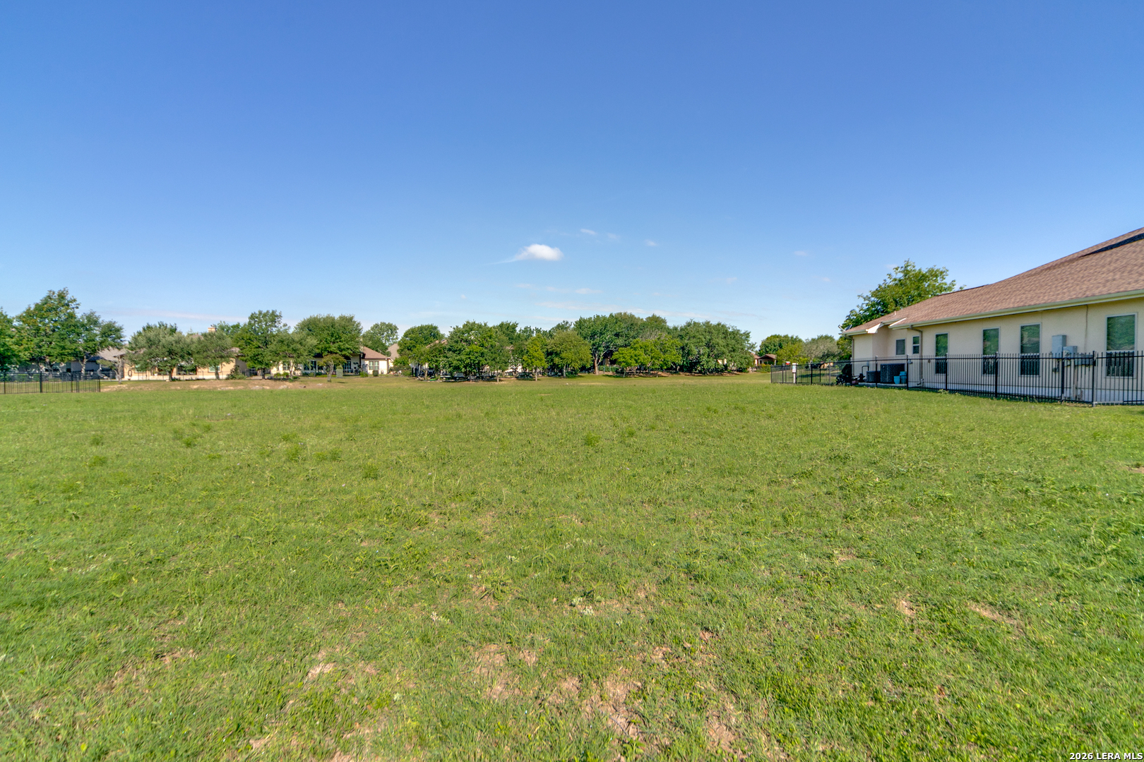 30039 Cibolo Path Fair Oaks Ranch, TX 78015 - Photo 10 of 11 a view of a large garden with plants and large trees