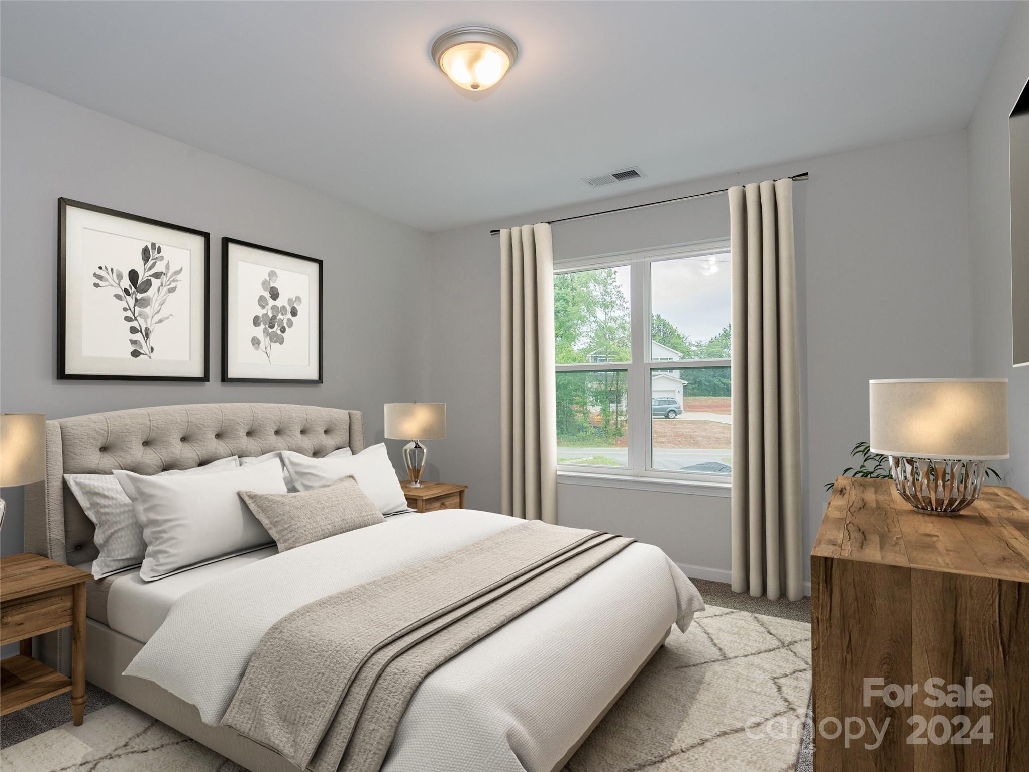 1122 Rhyne Road Charlotte, NC 28214 - Photo 15 of 22 a bedroom with a bed and a large window