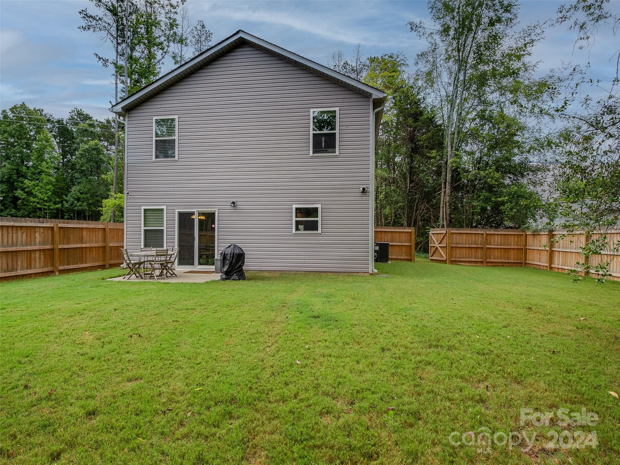 1122 Rhyne Road Charlotte, NC 28214 - Photo 21 of 22 a view of a house with backyard