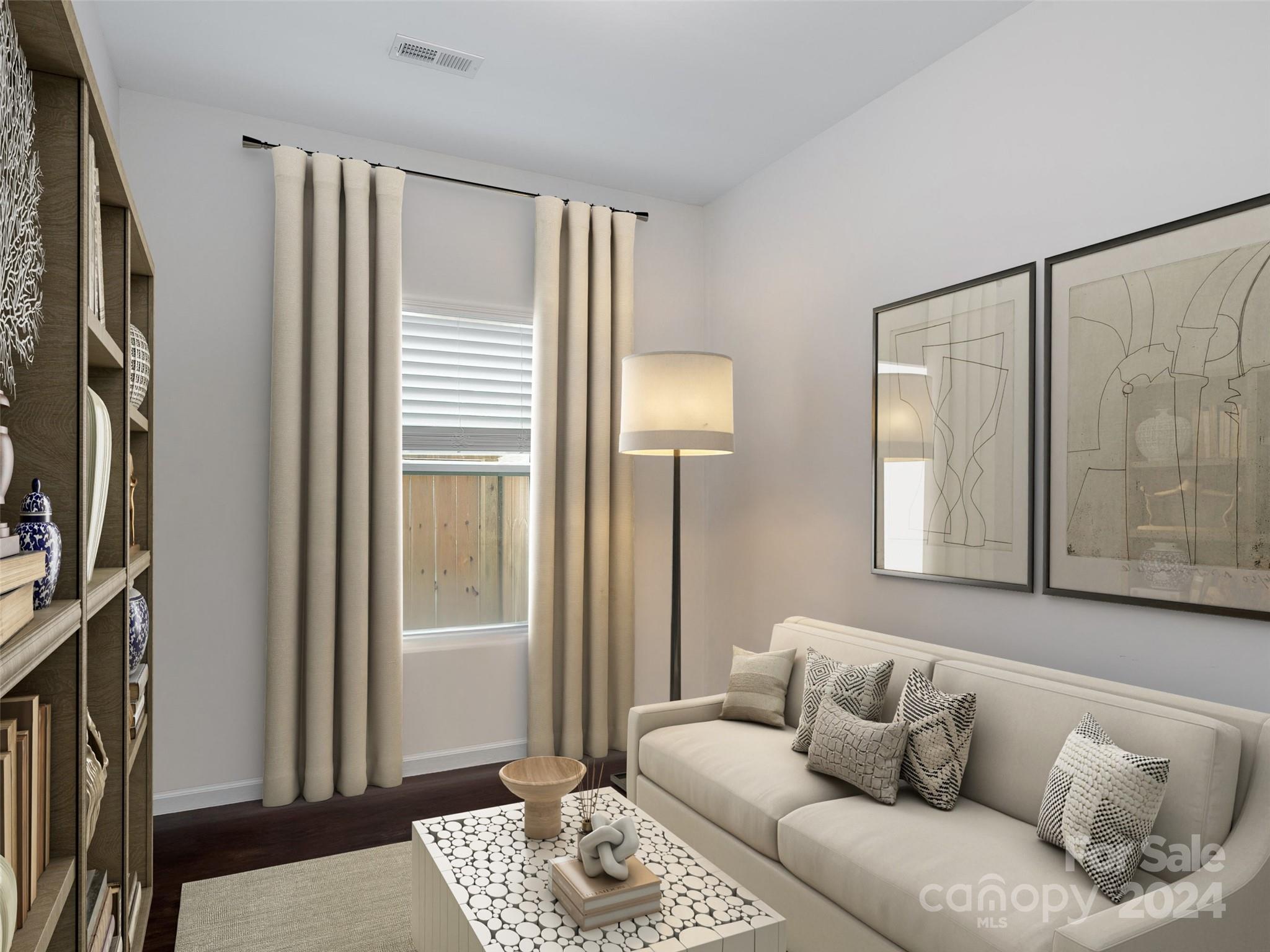 1122 Rhyne Road Charlotte, NC 28214 - Photo 9 of 22 a living room with furniture and a window