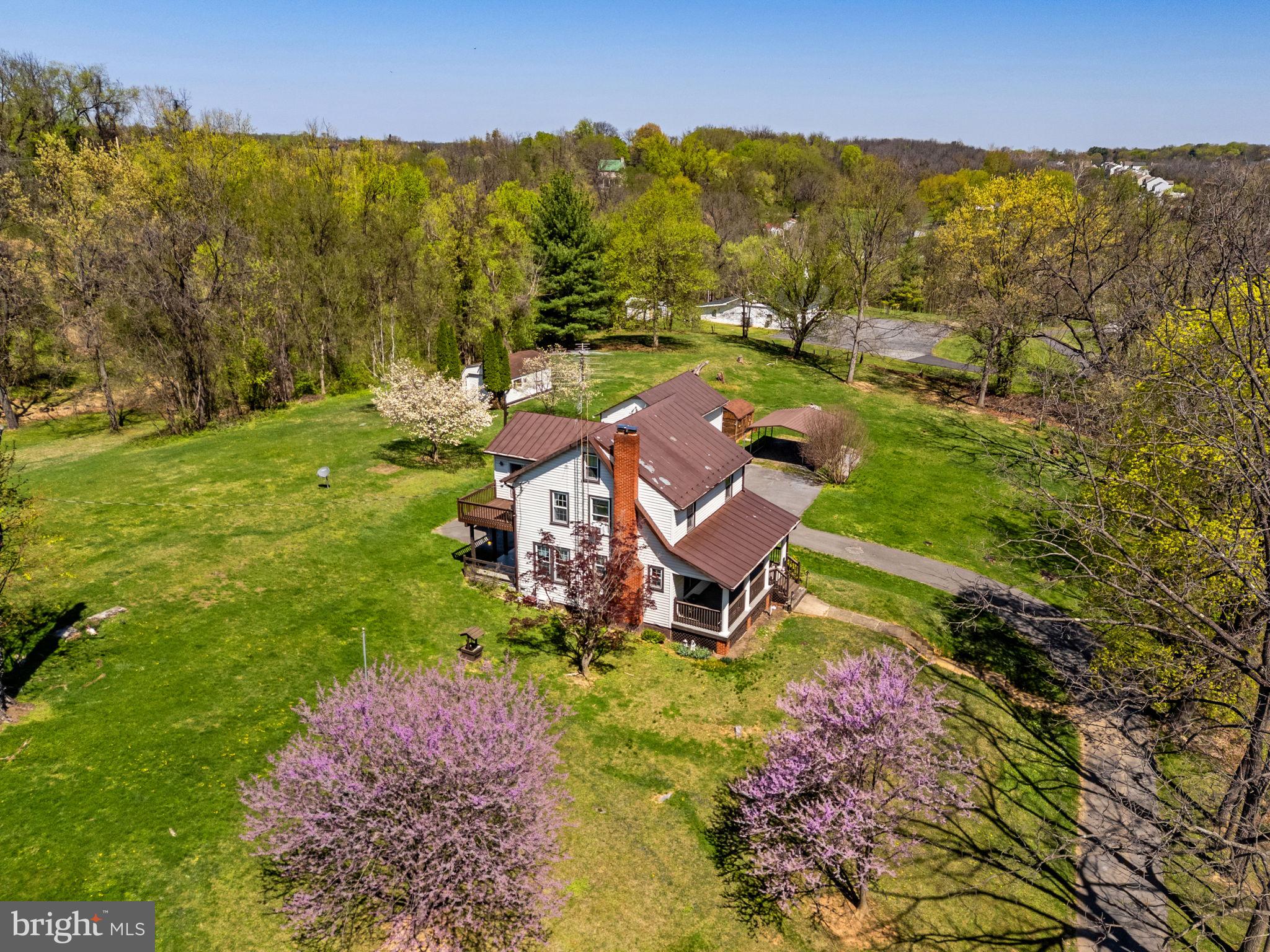 198 Henkle Moore Road Harpers Ferry, WV 25425 - Photo 1 of 73 an aerial view of a house with garden
