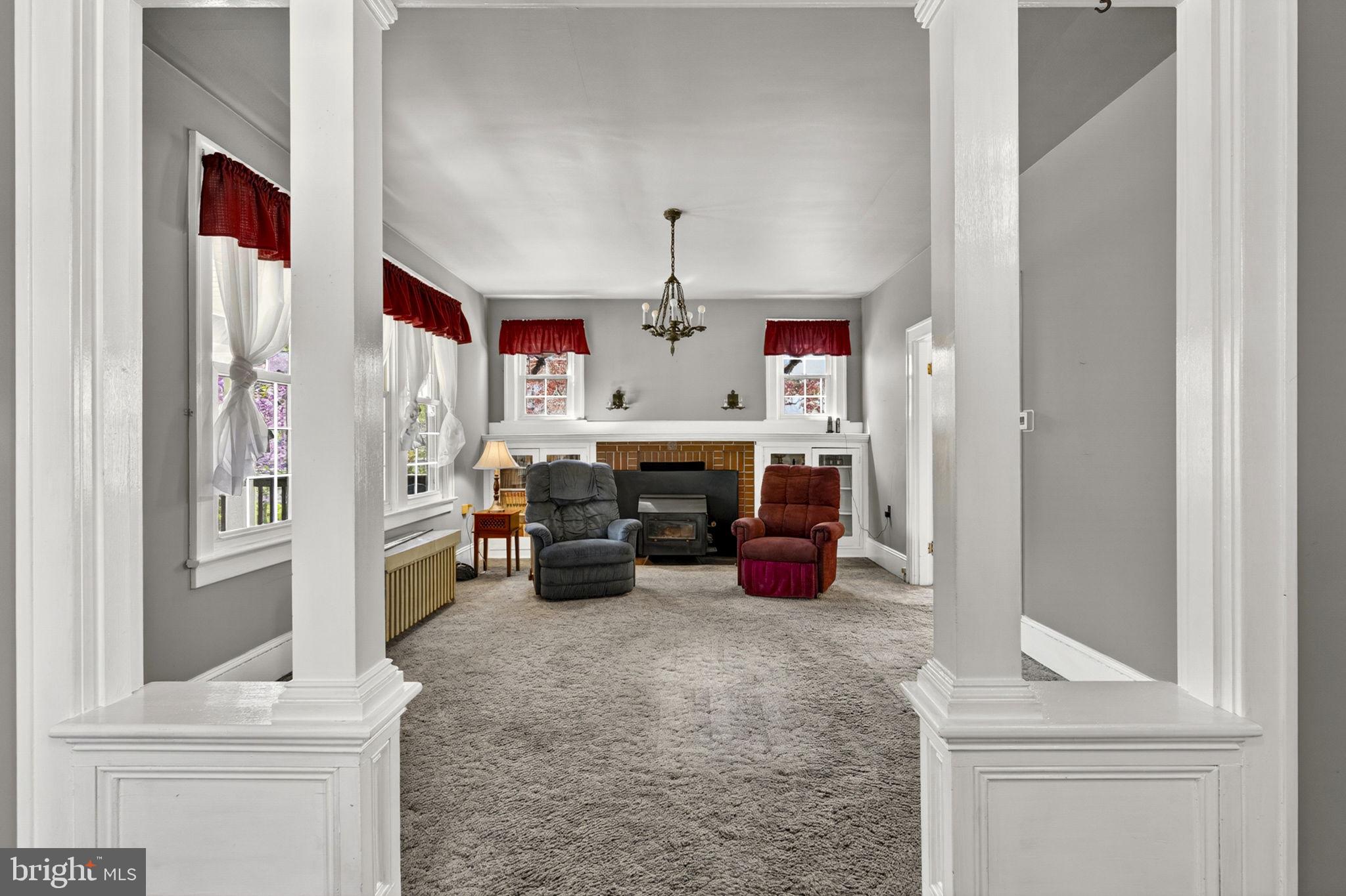 198 Henkle Moore Road Harpers Ferry, WV 25425 - Photo 20 of 73 a living room with furniture and a chandelier