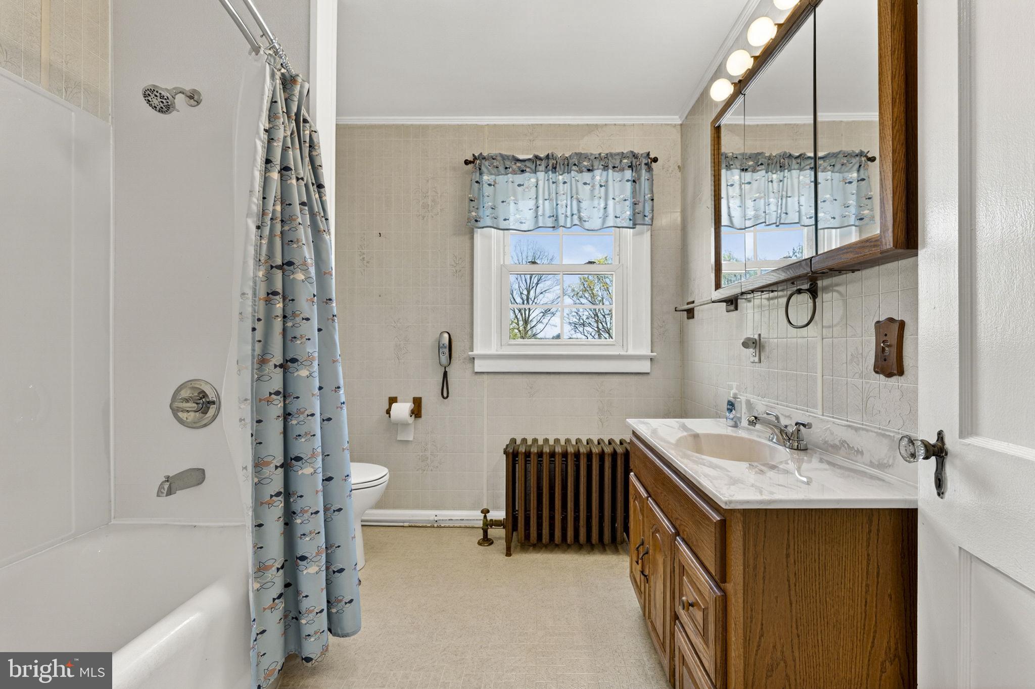 198 Henkle Moore Road Harpers Ferry, WV 25425 - Photo 35 of 73 a bathroom with a tub sink and a mirror