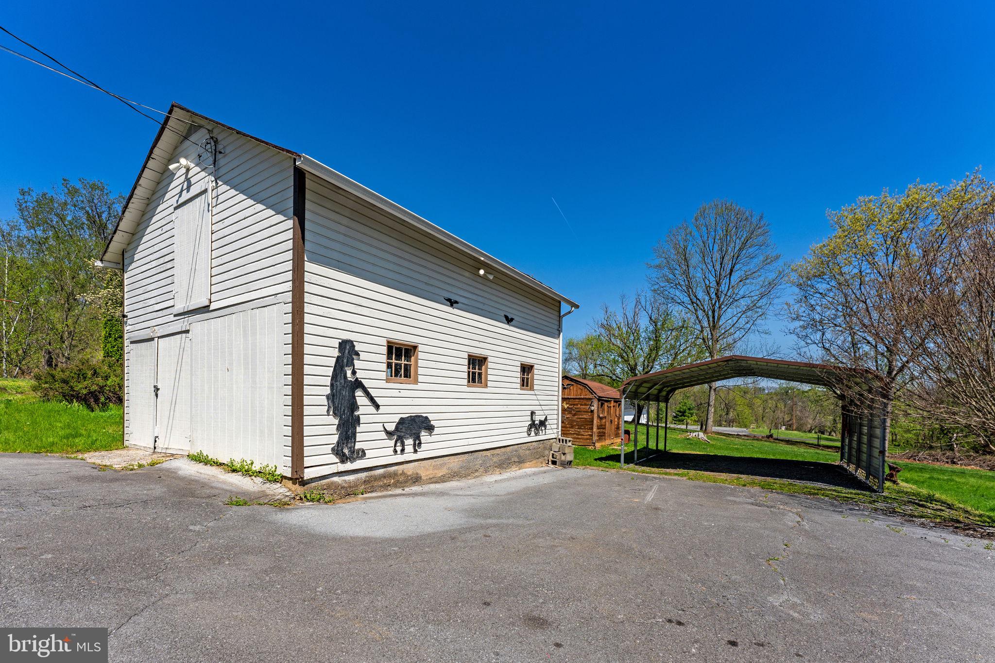 198 Henkle Moore Road Harpers Ferry, WV 25425 - Photo 49 of 73 a view of a house with a yard