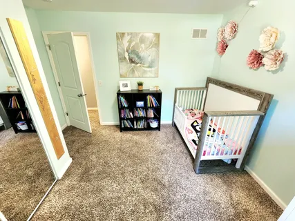 a view of entryway with a front door