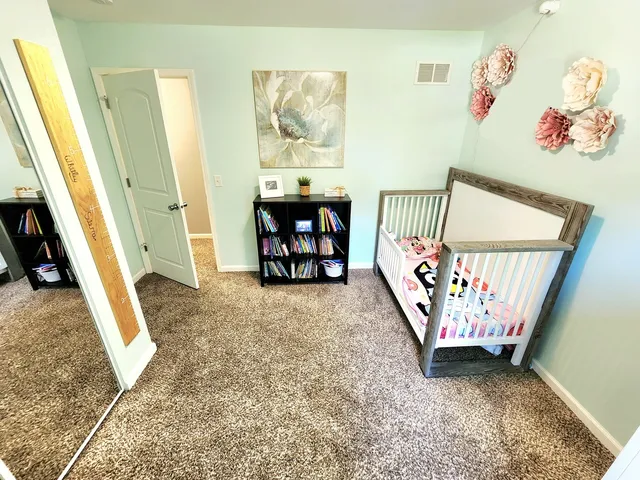 a view of entryway with a front door