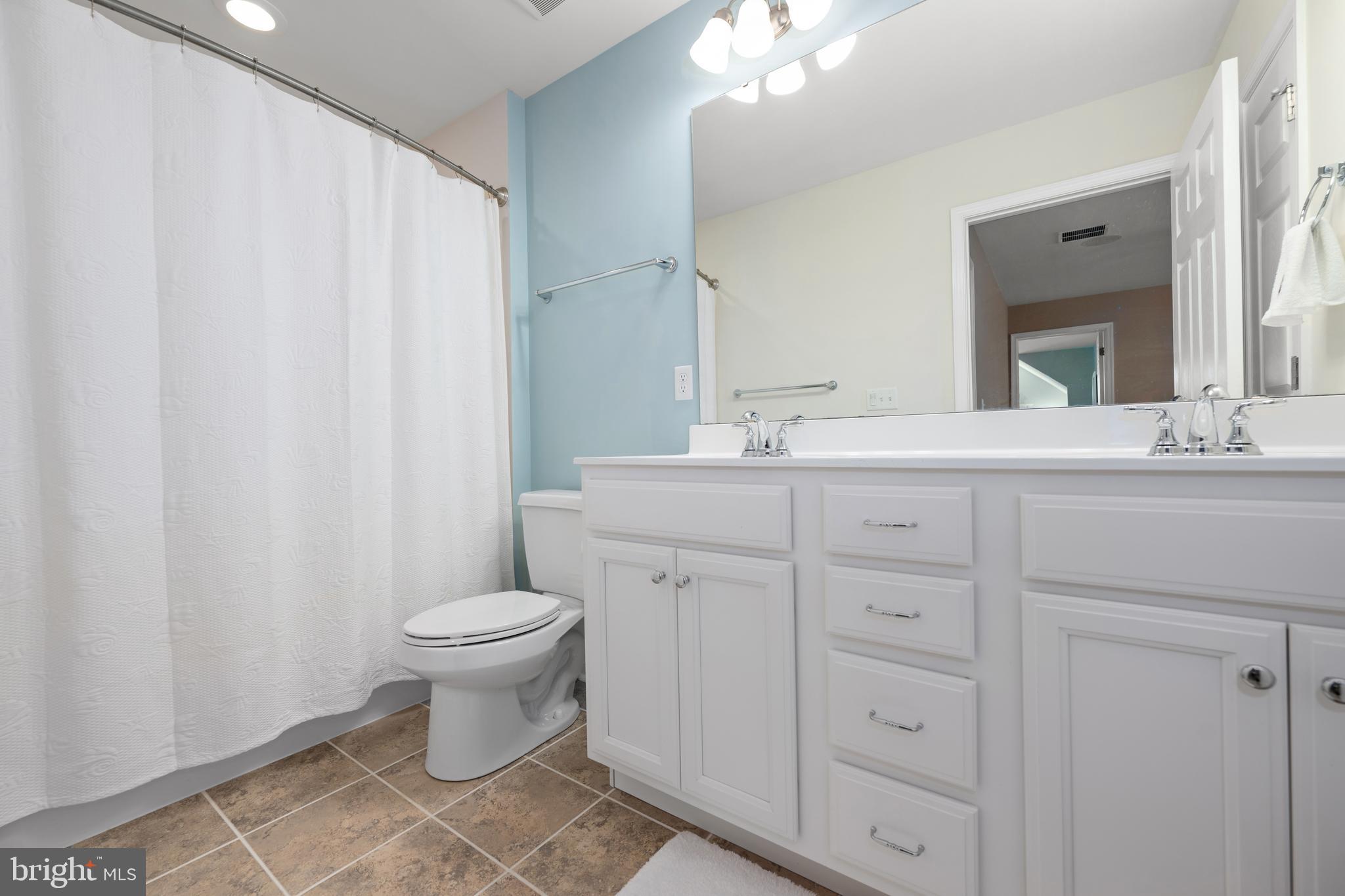 16620 Shoal Road Lewes, DE 19958 - Photo 30 of 60 2nd Floor Hall Bathroom