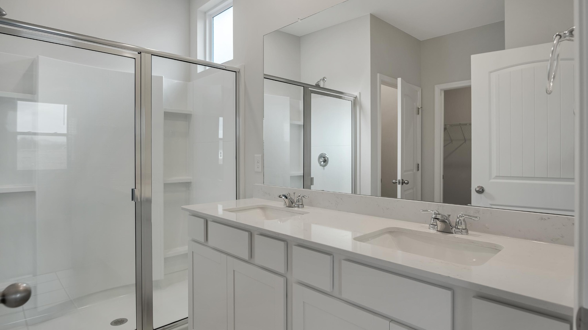 4918 Barnburgh Lane Murfreesboro, TN 37129 - Photo 11 of 24 a bathroom with a shower sink and mirror