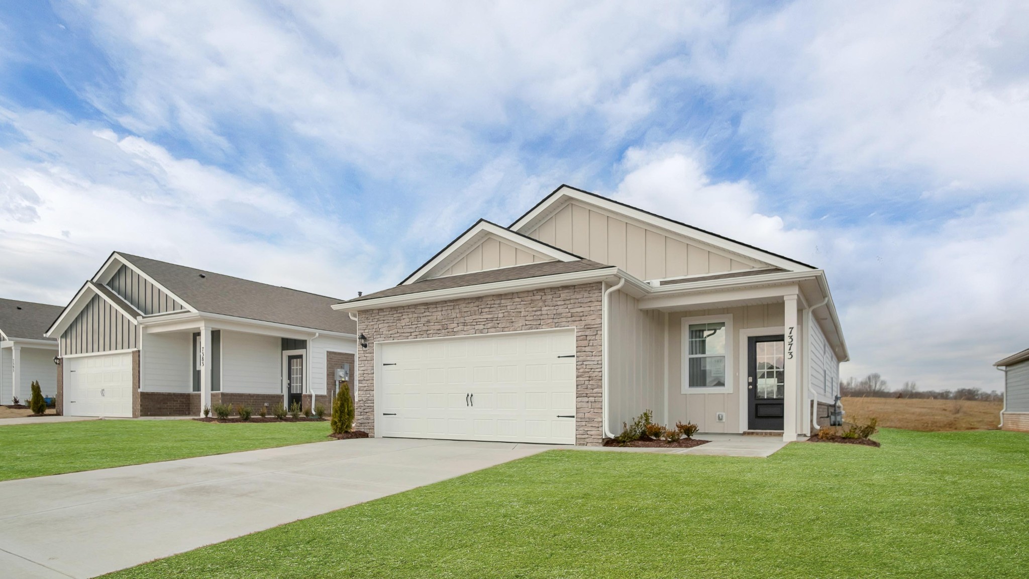 4918 Barnburgh Lane Murfreesboro, TN 37129 - Photo 13 of 24 a front view of a house with a yard and garage