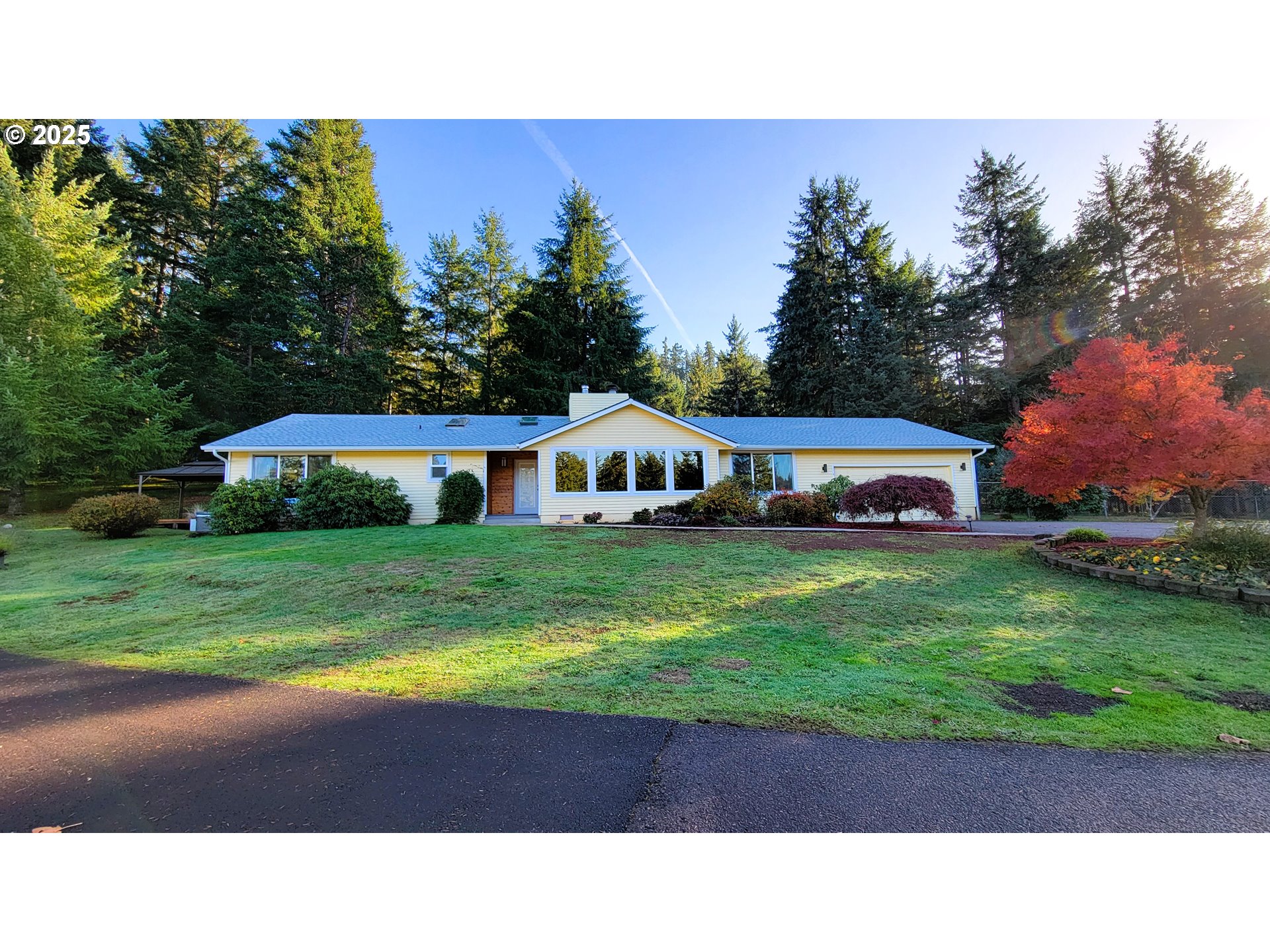34336 Stewart Hills Lane Cottage Grove, OR 97424 - Photo 1 of 40 a house view with a garden space