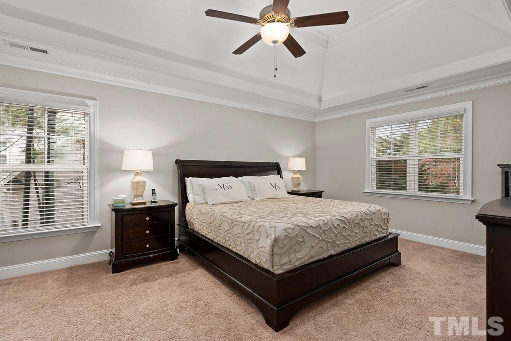 1217 Harrison Ridge Road Wake Forest, NC 27587 - Photo 13 of 30 a bedroom with a bed and window