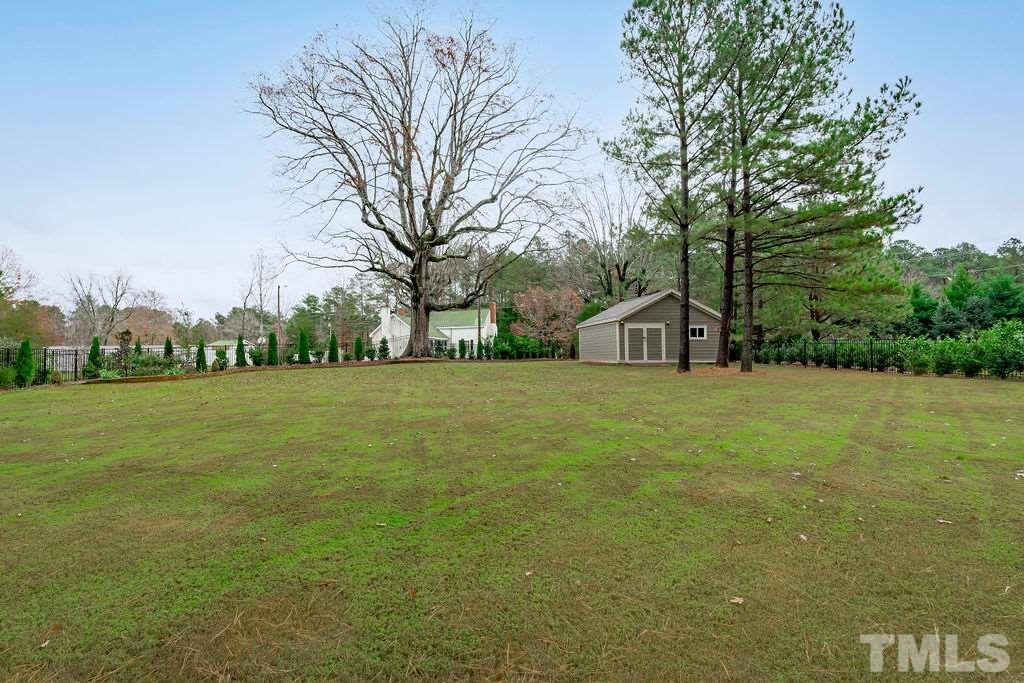 1217 Harrison Ridge Road Wake Forest, NC 27587 - Photo 19 of 30 a view of a house with a yard