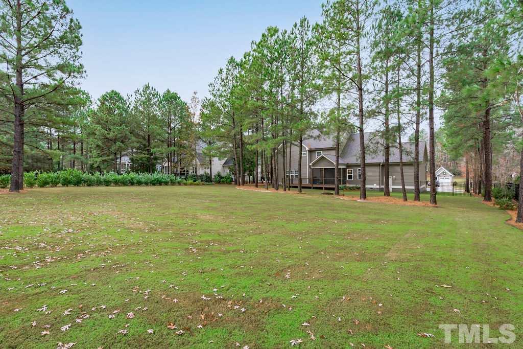 1217 Harrison Ridge Road Wake Forest, NC 27587 - Photo 21 of 30 a house view with a garden space