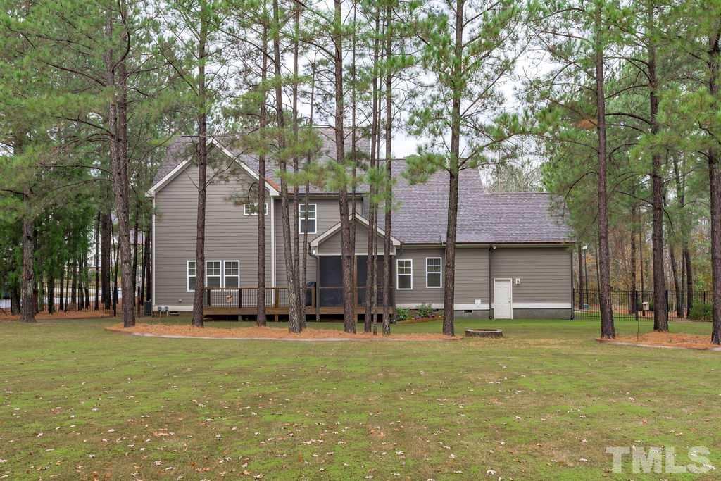 1217 Harrison Ridge Road Wake Forest, NC 27587 - Photo 22 of 30 front view of house with a yard