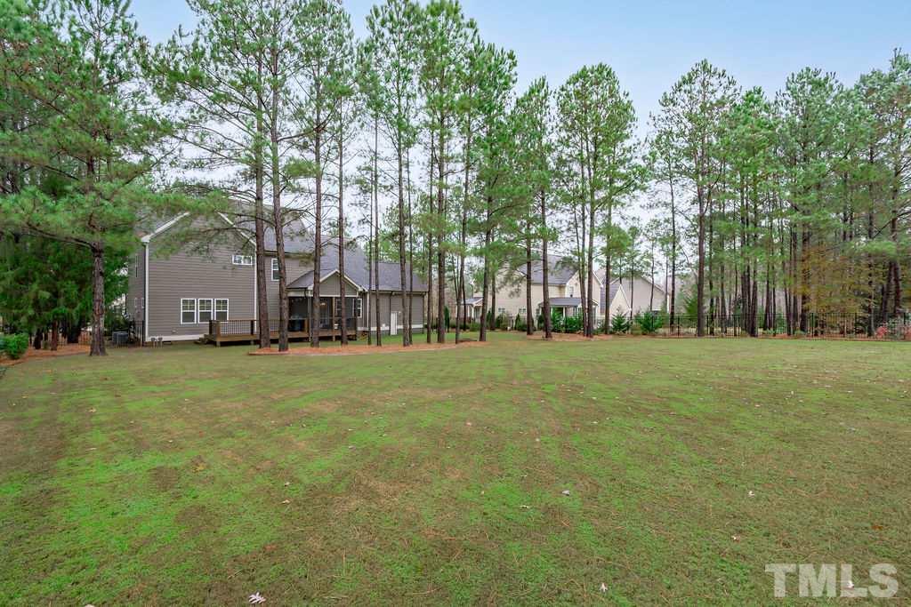 1217 Harrison Ridge Road Wake Forest, NC 27587 - Photo 23 of 30 a view of backyard with green space