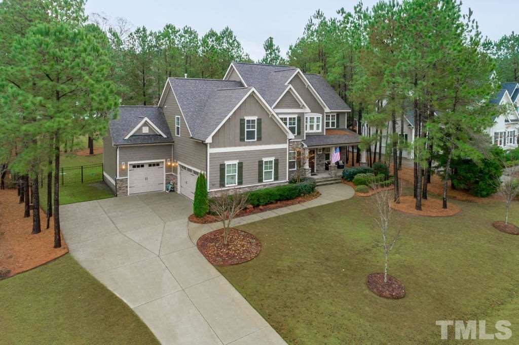1217 Harrison Ridge Road Wake Forest, NC 27587 - Photo 27 of 30 a aerial view of a house with swimming pool and sitting area