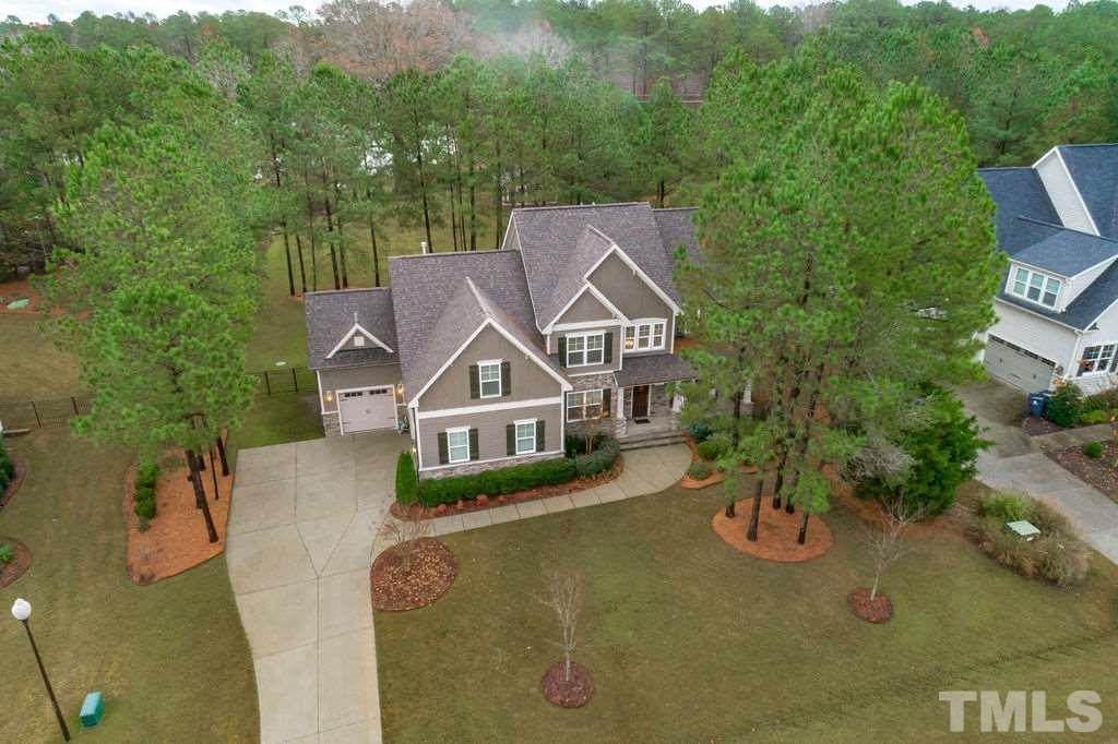 1217 Harrison Ridge Road Wake Forest, NC 27587 - Photo 28 of 30 a front view of a house with a yard