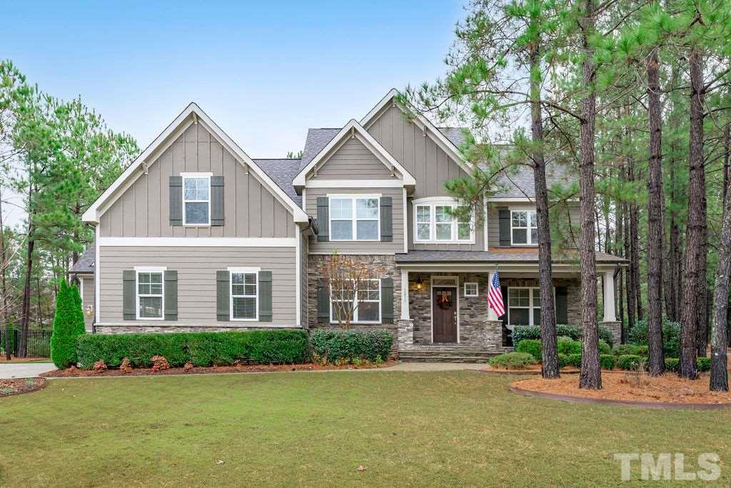 1217 Harrison Ridge Road Wake Forest, NC 27587 - Photo 29 of 30 front view of a house with a yard