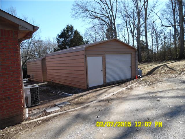 310 Manzano Road Madison, TN 37115 - Photo 8 of 8 Detached one car garage and storage in the rear of each unit.