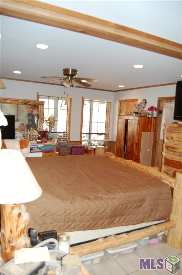 10310 Sims Road Denham Springs, LA 70706 - Photo 18 of 37 Master Bedroom with Sitting Area