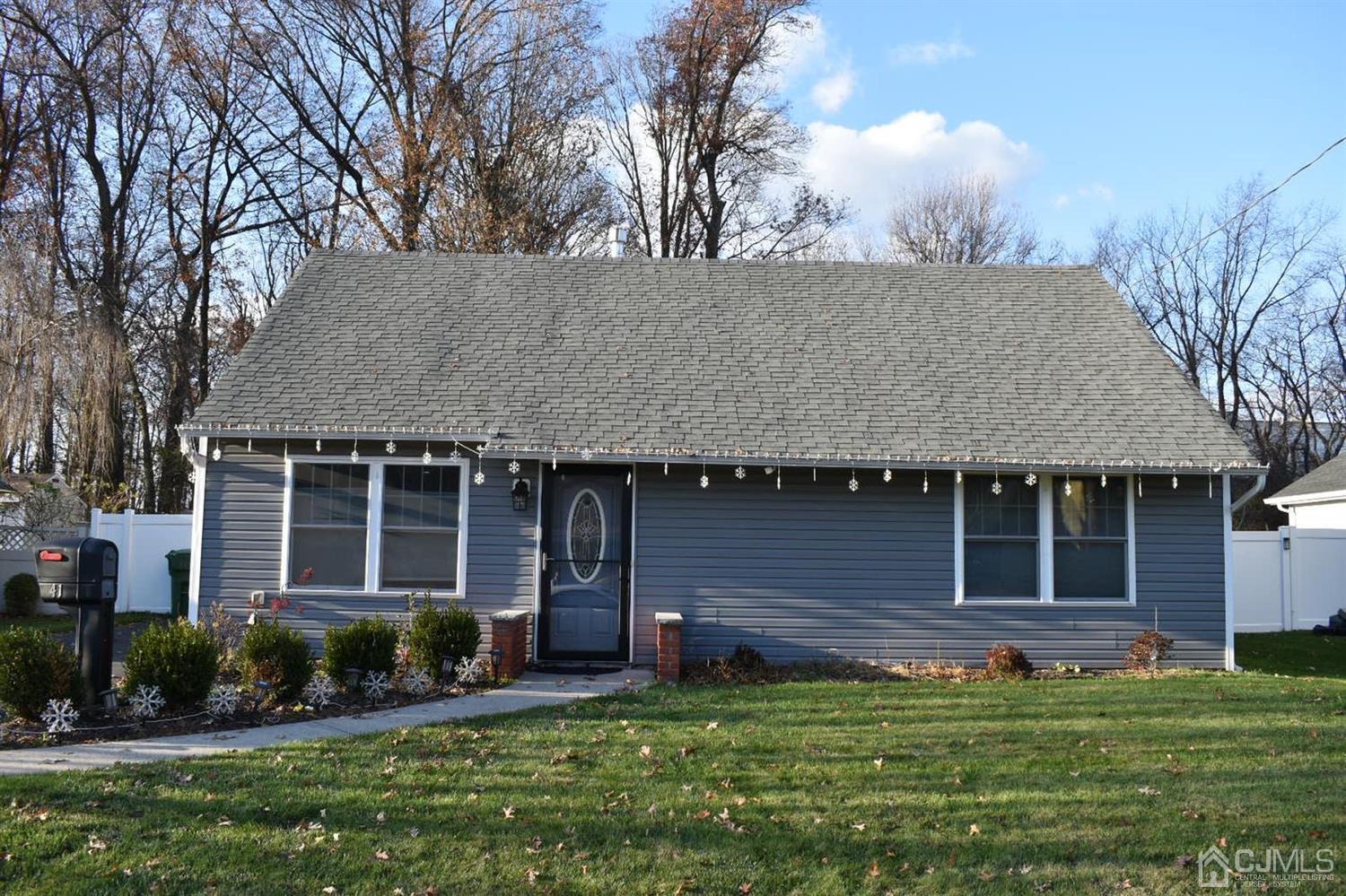 41 Caldwell Road Edison, NJ 08817 - Photo 1 of 16 a front view of a house with a yard