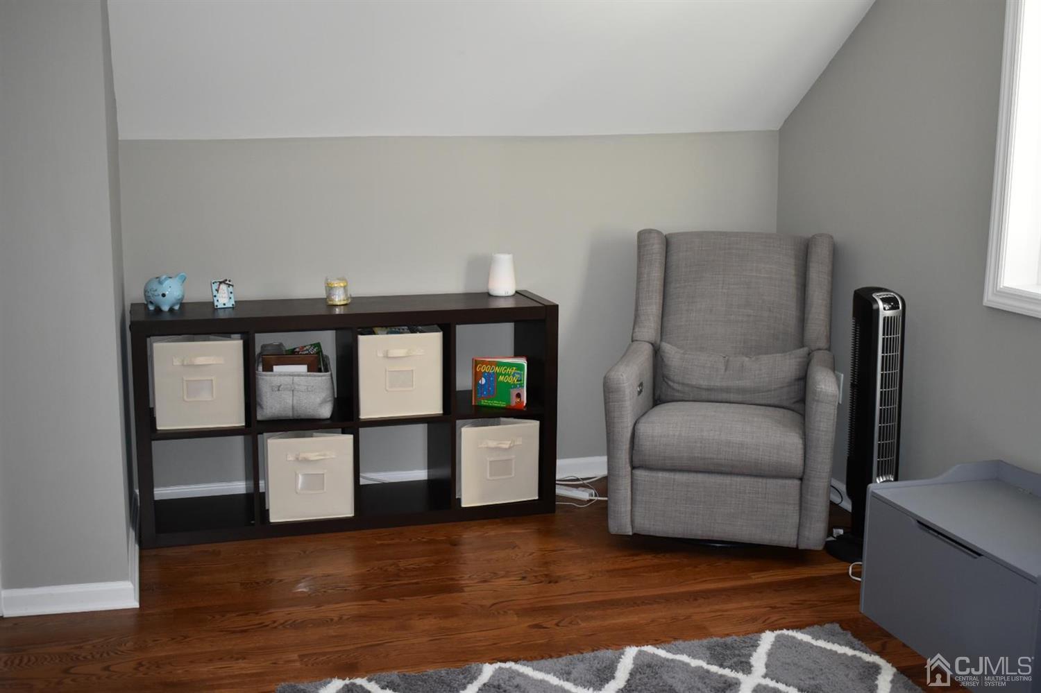 41 Caldwell Road Edison, NJ 08817 - Photo 13 of 16 a living room with furniture and a wooden floor